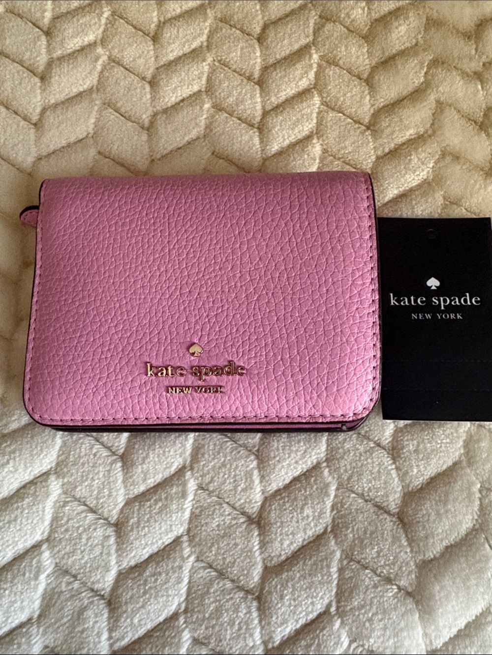 kate spade Pink Pebbled Leather Fold Wallet with Gold Logo